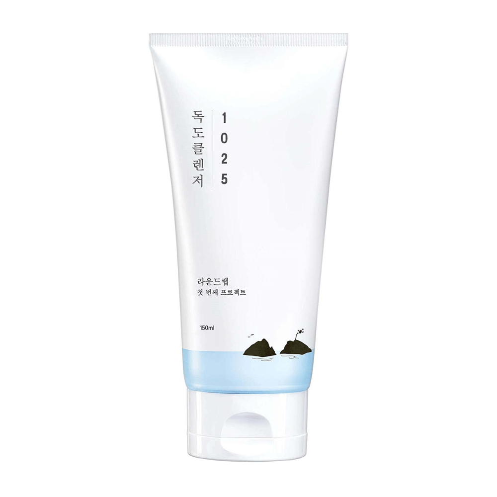 Round Lab 1025 Dokdo Cleanser in a white tube with a blue bottom and black print, isolated against a white background.