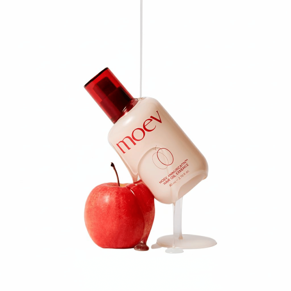 MOEV Annurcatin Hair Oil Essence med rött äpple – hårolja inspirerad av Annurca-äpplets antioxidanter för starkare, glansigare och friskare hårstrån.