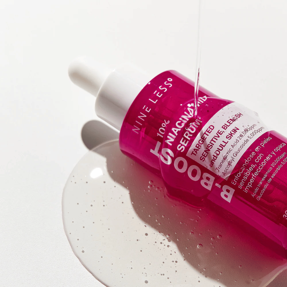 B-Boost 10% Niacinamide Serum, dripping from the dropper.