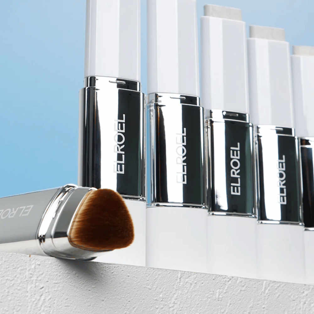 ELROEL Blanc Cover Cream Stick concealer with several shades applied as swatches showing color, coverage, and creamy consistency.