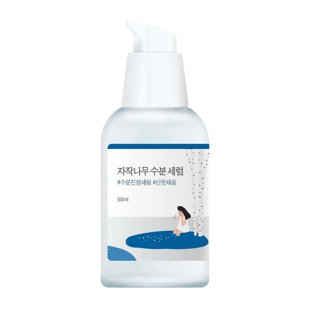 Round Lab Birch Juice Moisturizing Serum in a transparent pump bottle with a blue and white label and illustration of birch and girl, isolated against a white background.