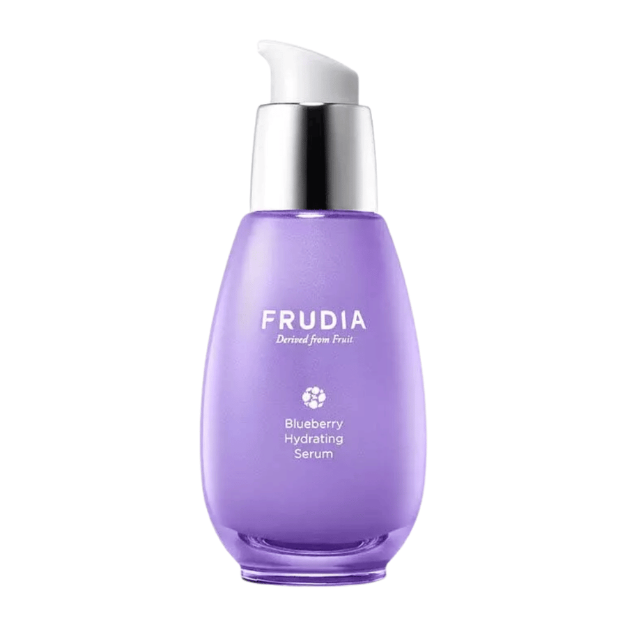 FRUDIA Blueberry Hydrating Serum in a purple bottle with a pump, hydrating facial serum with blueberry extract that strengthens the skin barrier and provides soft, clear skin.