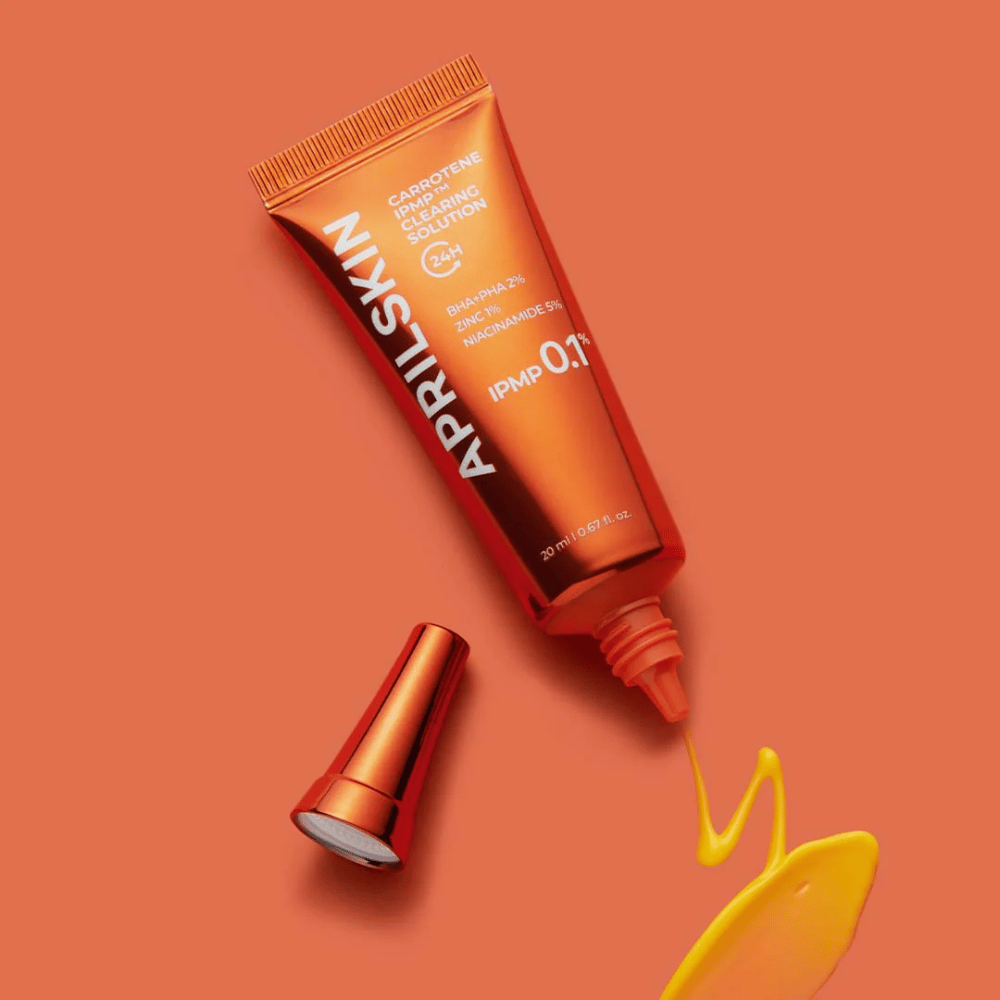 APRILSKIN Carrotene IPMP Clearing Solution in tube with yellow formula, spot treatment for acne with BHA PHA 2%, zinc and niacinamide