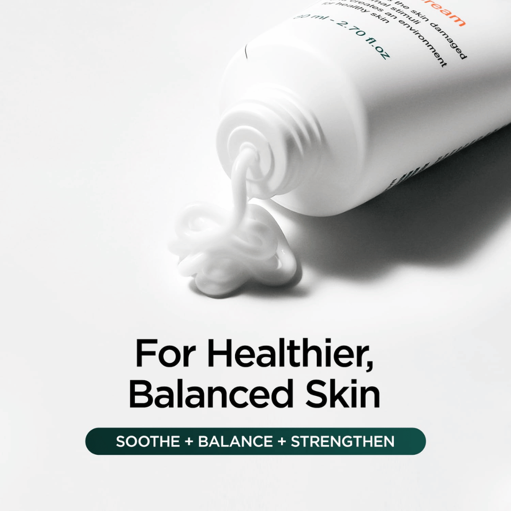 Close-up of white face cream being squeezed out of the tube from P.CALM Cato Cream. The image emphasizes the soft, creamy texture and the product’s focus on soothing, balancing, and strengthening the skin.