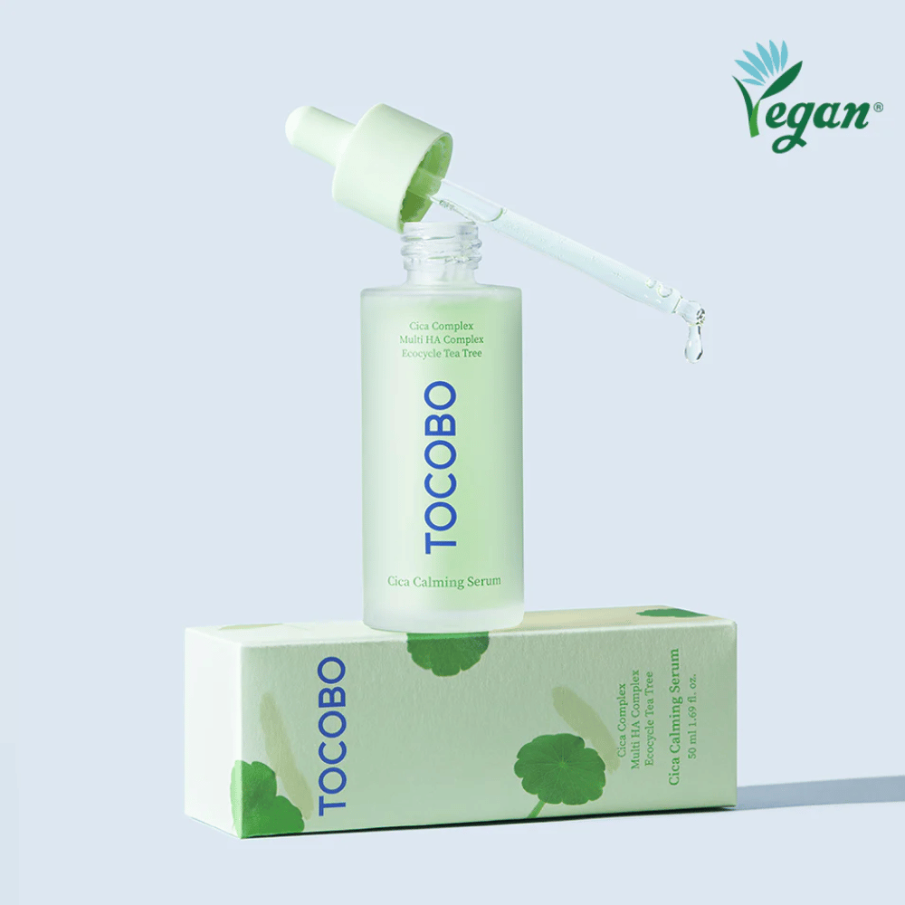 TOCOBO Cica Calming Serum placed on product packaging with pipette, light and soothing K-beauty serum for irritated and acne-prone skin, vegan formula with cica complex.