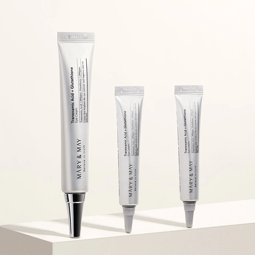 Eye cream from Mary&May with tranexamic acid and glutathione in multiple sizes, designed to reduce pigmentation and provide clearer skin around the eyes.