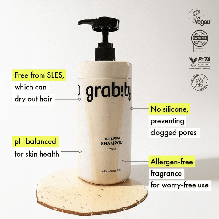 Grabity g0.0 Hair Lifting Shampoo Strong with information about an SLES-free formula, silicone-free composition, allergen-free fragrance, and certifications for vegan and gentle hair care.