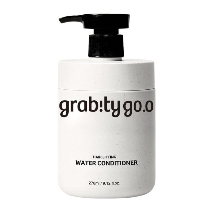 Grabity Hair Lifting Water Conditioner in a sleek white pump bottle against a light background. A volumizing hair conditioner formula developed to provide softness, shine, and a fuller-looking hair appearance.