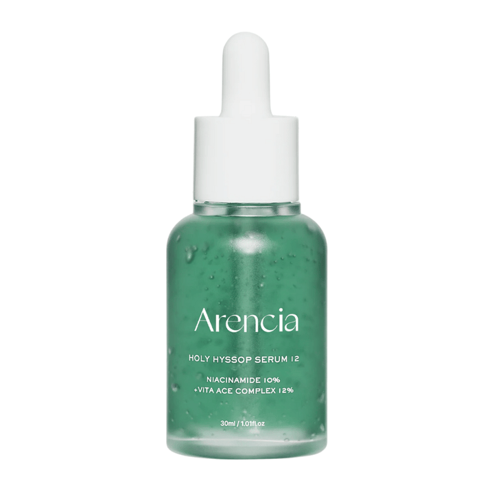 Arencia Holy Hyssop Serum 12 in green glass bottle with pipette, facial serum with niacinamide 10% and vitamin ACE complex 12%.