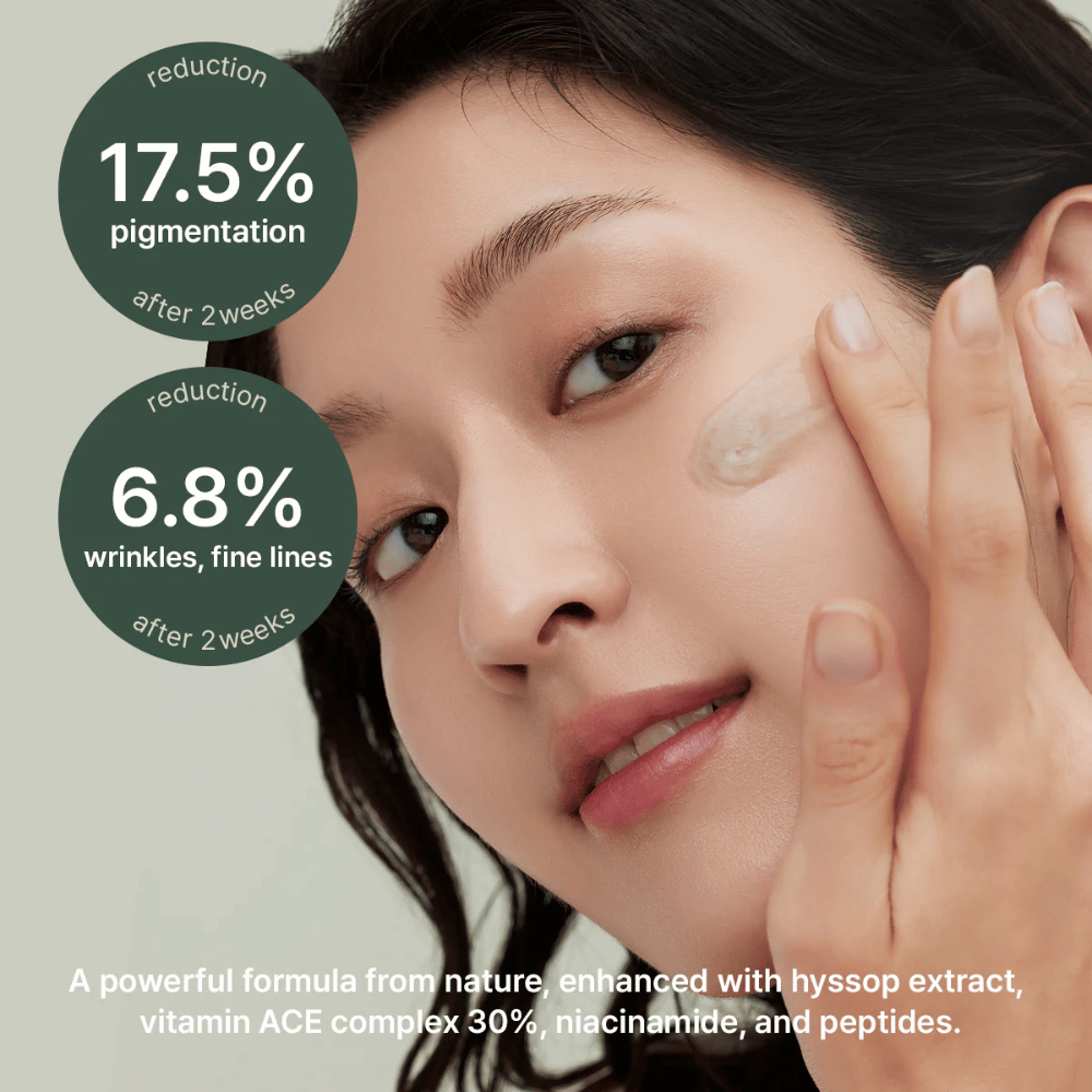 Woman applies Arencia Holy Hyssop Serum 30 – clinically tested serum that reduces pigmentation by 17.5% and fine lines by 6.8% in two weeks.
