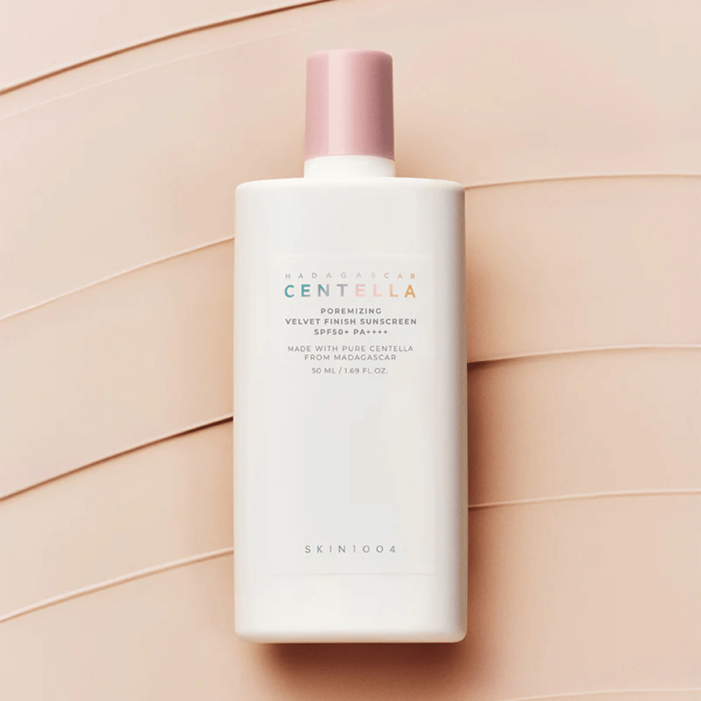 SKIN1004 Madagascar Centella Poremizing Velvet Finish Sunscreen SPF 50+ PA++++ with Centella Asiatica that soothes the skin and leaves a comfortable, matte finish without a white cast.