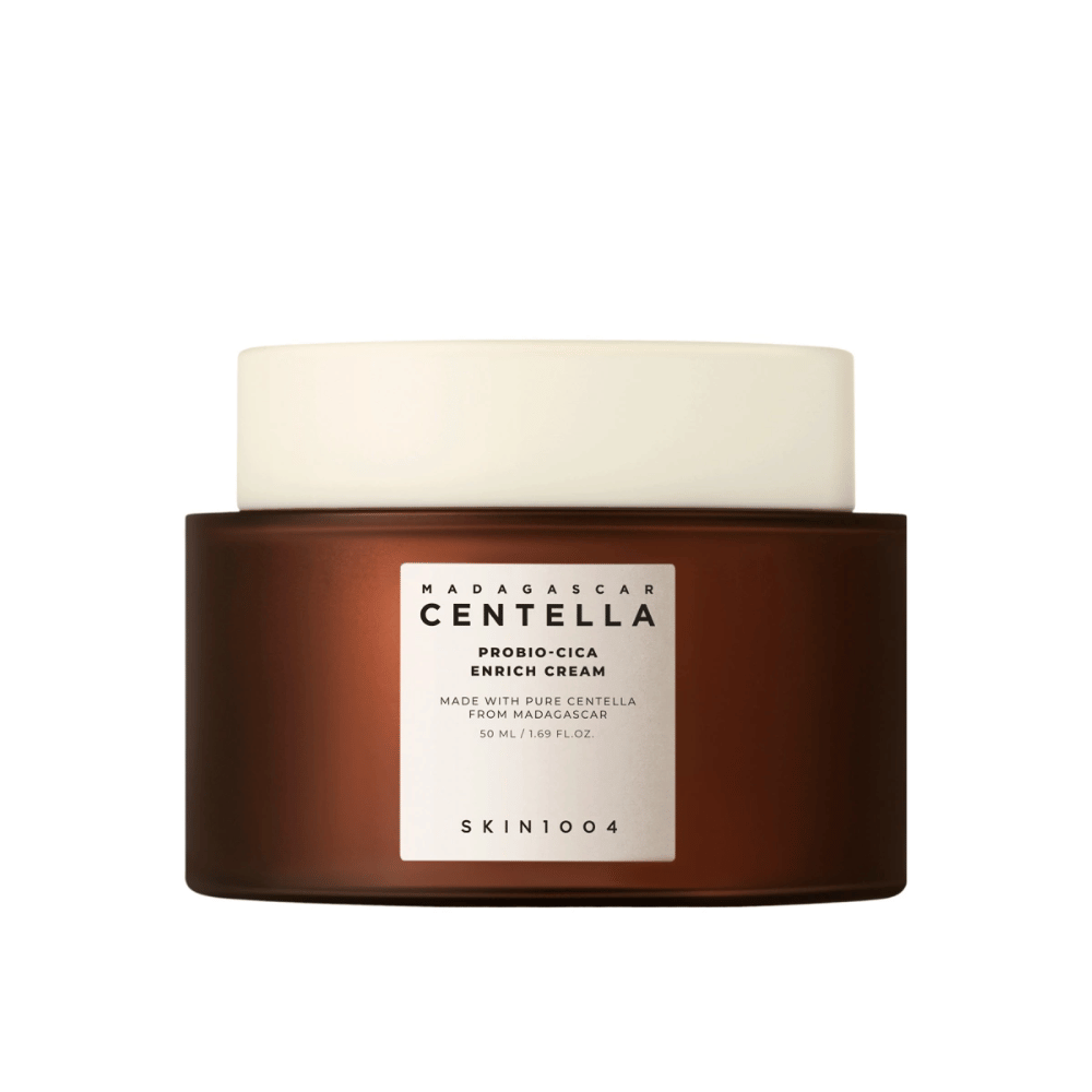 A brown jar with Madagascar Centella Probio-Cica Enrich Cream against a neutral background.