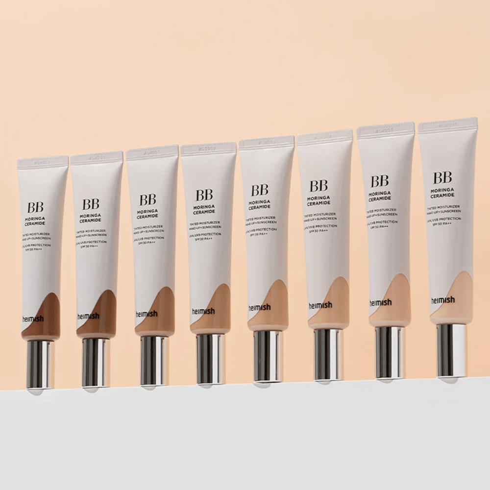Row of Heimish Moringa Ceramide BB Cream in several color shades. The image illustrates the variation from lighter to darker tones to suit different skin tones and needs.