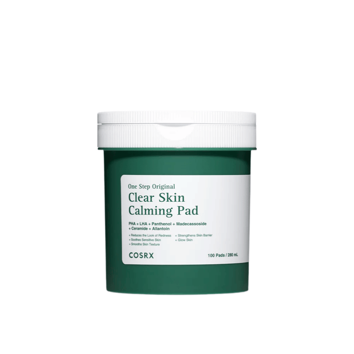 Cut-out product image of COSRX One Step Original Clear Skin Calming Pad in green packaging against a light background.