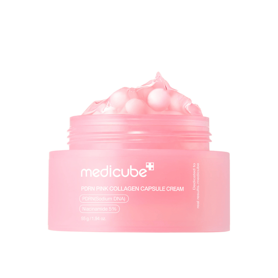 Produktbild av Medicube PDRN Pink Collagen Capsule Cream med synliga rosa kapslar i en transparent rosa burk, designad för att återfukta och jämna ut hudtonen.