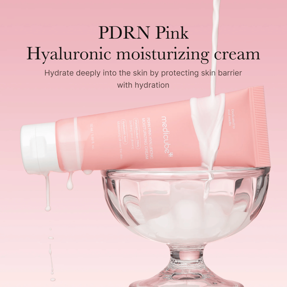 Medicube PDRN Pink Hyaluronic Moisturizing Cream in a pink tube held down in a glass bowl, with text emphasizing deep hydration and skin barrier protection.