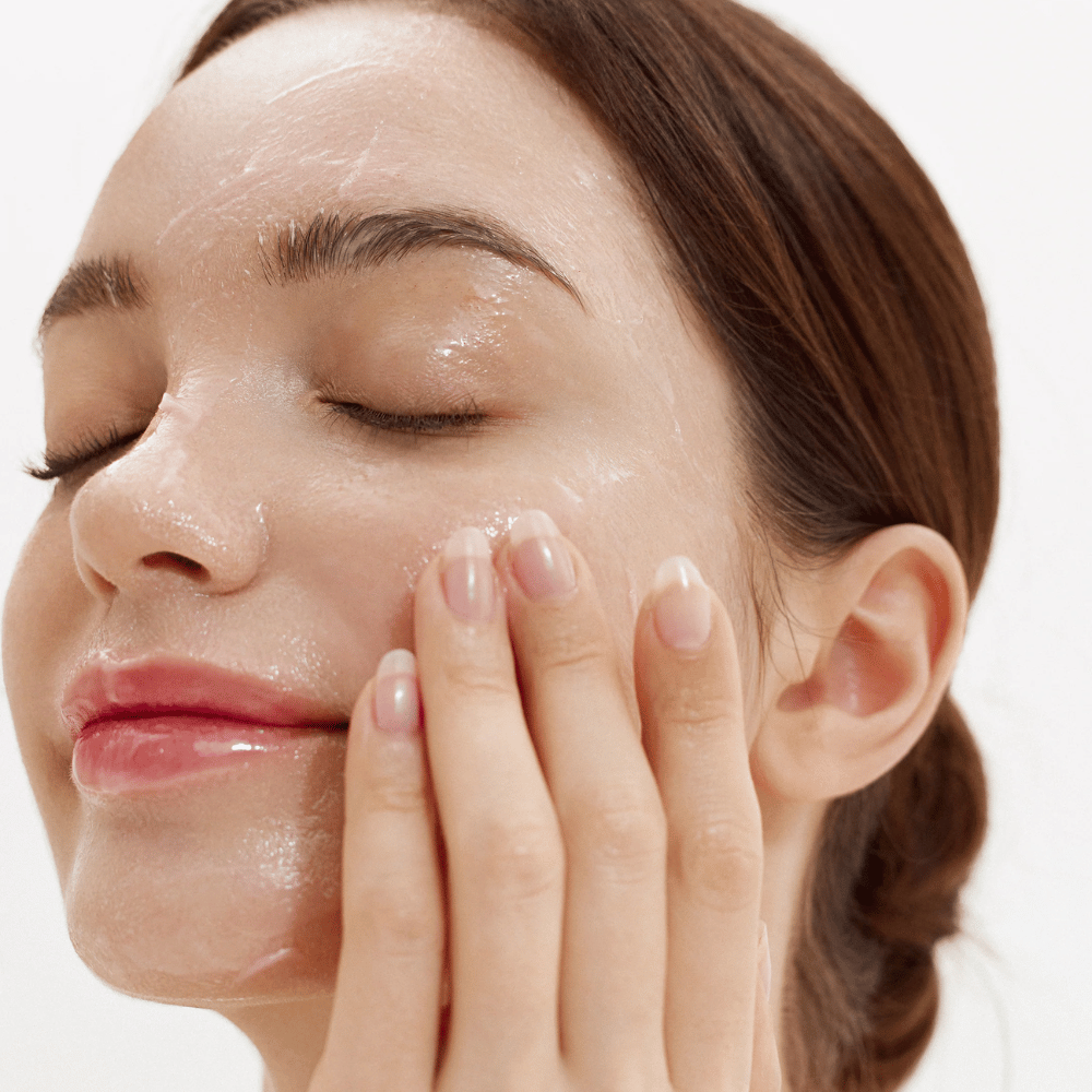 How Purifying Cleansing Balm applied to the face. Creamy balm that melts upon contact with the skin and gently removes dirt, sunscreen, and makeup.