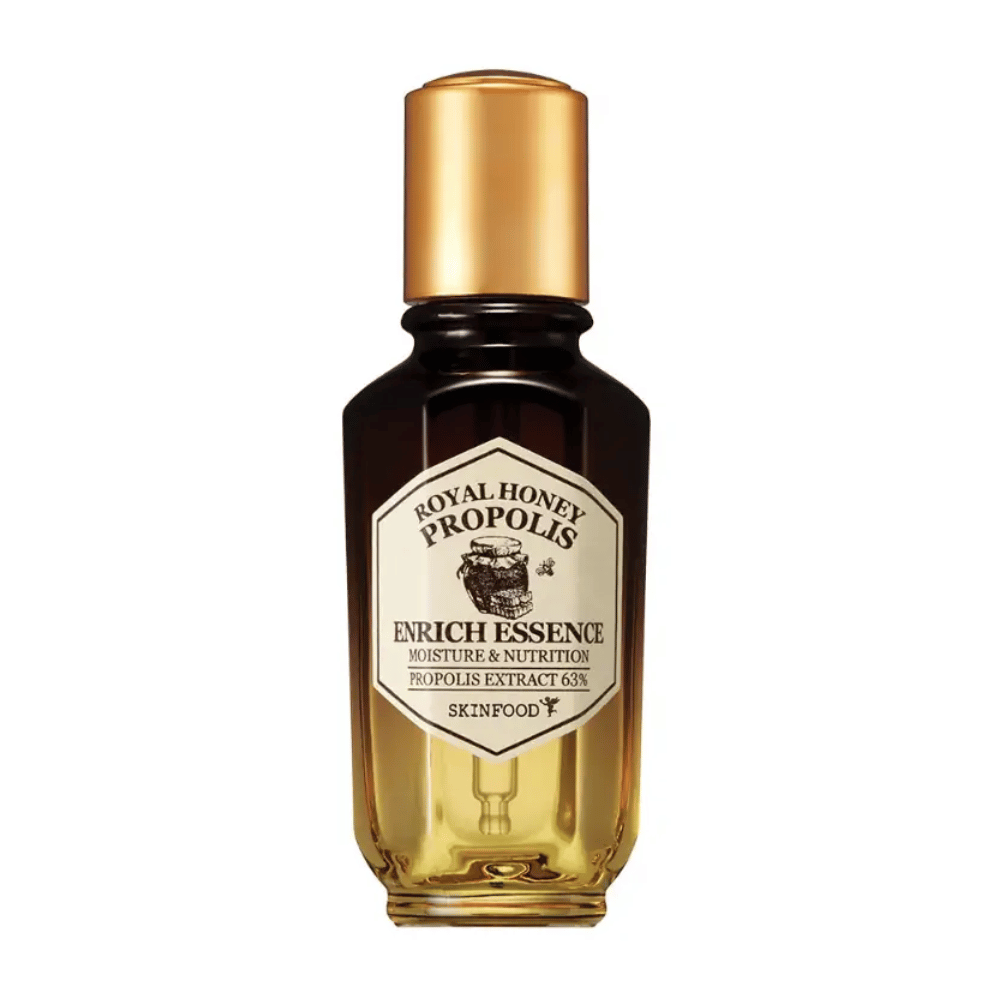 Image of a glass bottle with dark liquid and a gold-colored cap. On the bottle's label, it says "Royal Honey Propolis Enrich Essence" followed by "Moisture & Nutrition" and "Propolis Extract 63%". The brand "Skinfood" is also visible at the bottom of the label.