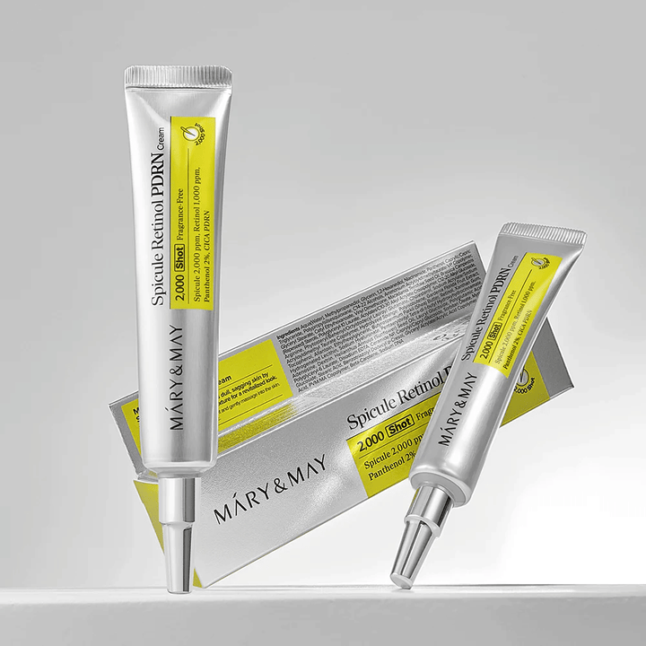 MARY & MAY Spicule Retinol PDRN Cream in a tube together with original packaging, a Korean face cream with retinol and PDRN that supports skin regeneration.