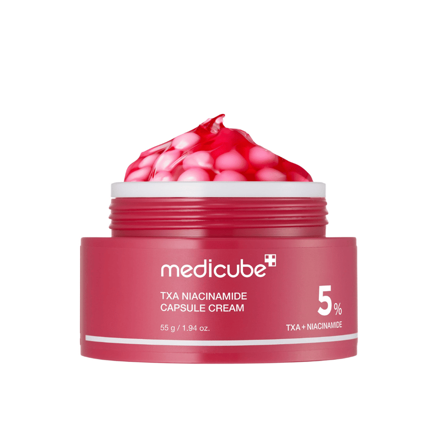 Medicube TXA Niacinamide Capsule Cream i burk med rosa kapslar i geléform, visande tydlig produktmärkning med 5 % TXA + Niacinamide.