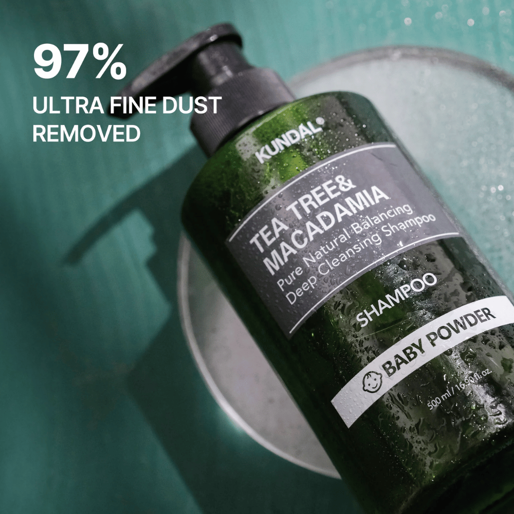 Close-up of KUNDAL Tea Tree & Macadamia Shampoo focusing on deep-cleansing properties and that the product helps remove ultrafine particles and dirt.