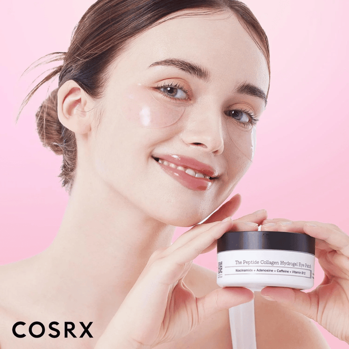 Model with COSRX Peptide Collagen Hydrogel Eye Patch – provides glow and hydration for tired skin under the eyes.