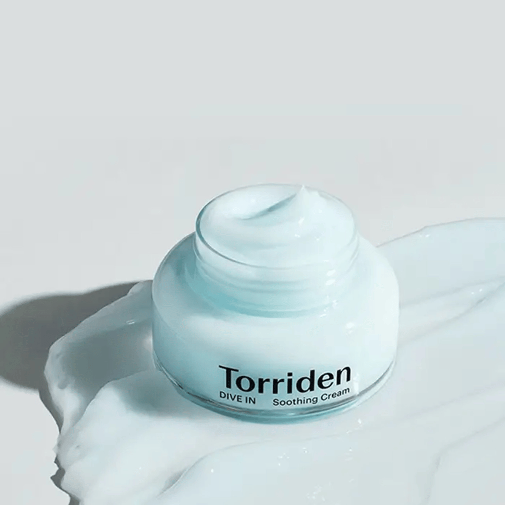 Torriden DIVE-IN Low Molecular Hyaluronic Acid Soothing Cream 100ml provides long-lasting hydration on a white surface.