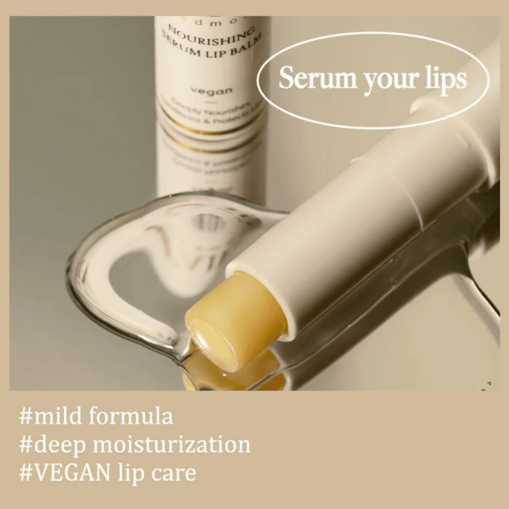 d'Alba Nourishing Serum Lip Balm in close-up lying on a mirror with text about mild formula, deep hydration and vegan lip care.