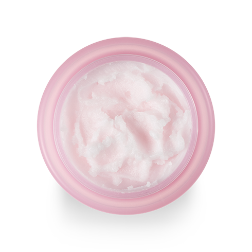 A pink jar with a small amount of Clean It Zero Cleansing Balm Original 100ml from BANILA CO in it, used for cleansing and skincare.